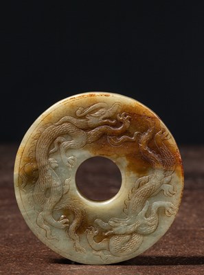 Lot 152 - A JADE BI DISC WITH DRAGONS CHINA QING DYNASTY (1644-1911)