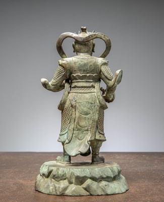 Lot 25 - A BRONZE FIGURE OF VIRŪPAKA, GUARDIAN KING OF THE WEST CHINA MING DYNASTY