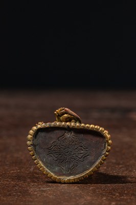 Lot 17 - A SEATED BRONZE GILT JAMBHALA TIBET 13TH CENTURY STYLE BUT LATER