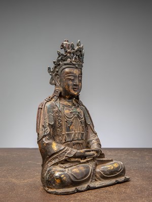 Lot 9 - A SEATED BRONZE FIGURE OF GUANYIN, CHINA, MING DYNASTY, 16TH CENTURY