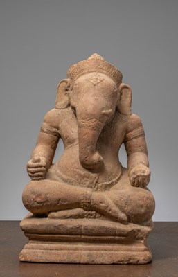 Lot 385 - A SEATED STONE GANESHA, ANGKOR WAT PERIOD, KHMER EMPIRE, 12TH CENTURY