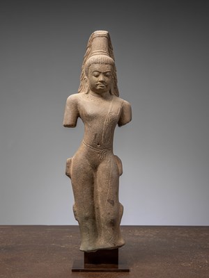 Lot 415 - A SANDSTONE AVALOKITESHVARA, 7TH CENTURY FROM THAILAND OR VIETNAM