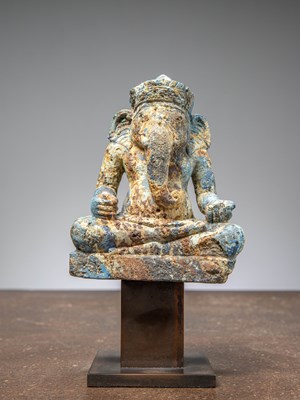 Lot 398 - A FIGURE OF SEATED GANESHA, AZULIT AND MALACHIT, 12TH CENTURY, ANGKOR WAT PERIOD, KHMER EMPIRE