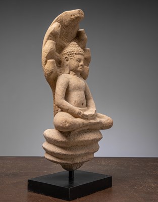 Lot 52 - SANDSTONE NAGA BUDDHA 11TH CENTURY BAPHUAN PERIOD