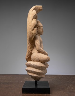 Lot 52 - SANDSTONE NAGA BUDDHA 11TH CENTURY BAPHUAN PERIOD