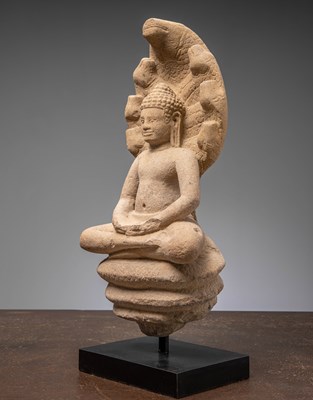 Lot 52 - SANDSTONE NAGA BUDDHA 11TH CENTURY BAPHUAN PERIOD