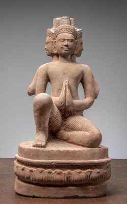 Lot 434 - A KNEEILING SANSTONE BRAHMA, ANGKOR WAT, 10TH CENTURY, BANTEAY SREI STYLE