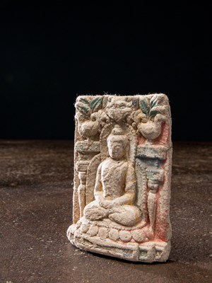 Lot 15 - A CHINESE POLYCHROME CLAY TSA TSA OF BUDDHA 13TH TO 15TH CENTURY
