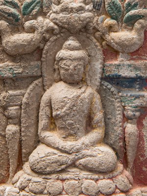 Lot 15 - A CHINESE POLYCHROME CLAY TSA TSA OF BUDDHA 13TH TO 15TH CENTURY