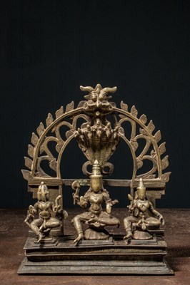 Lot 197 - INDIAN BRONZE SHRINE SHIVA , PARVATI AND SKANDA 16TH CENTURY