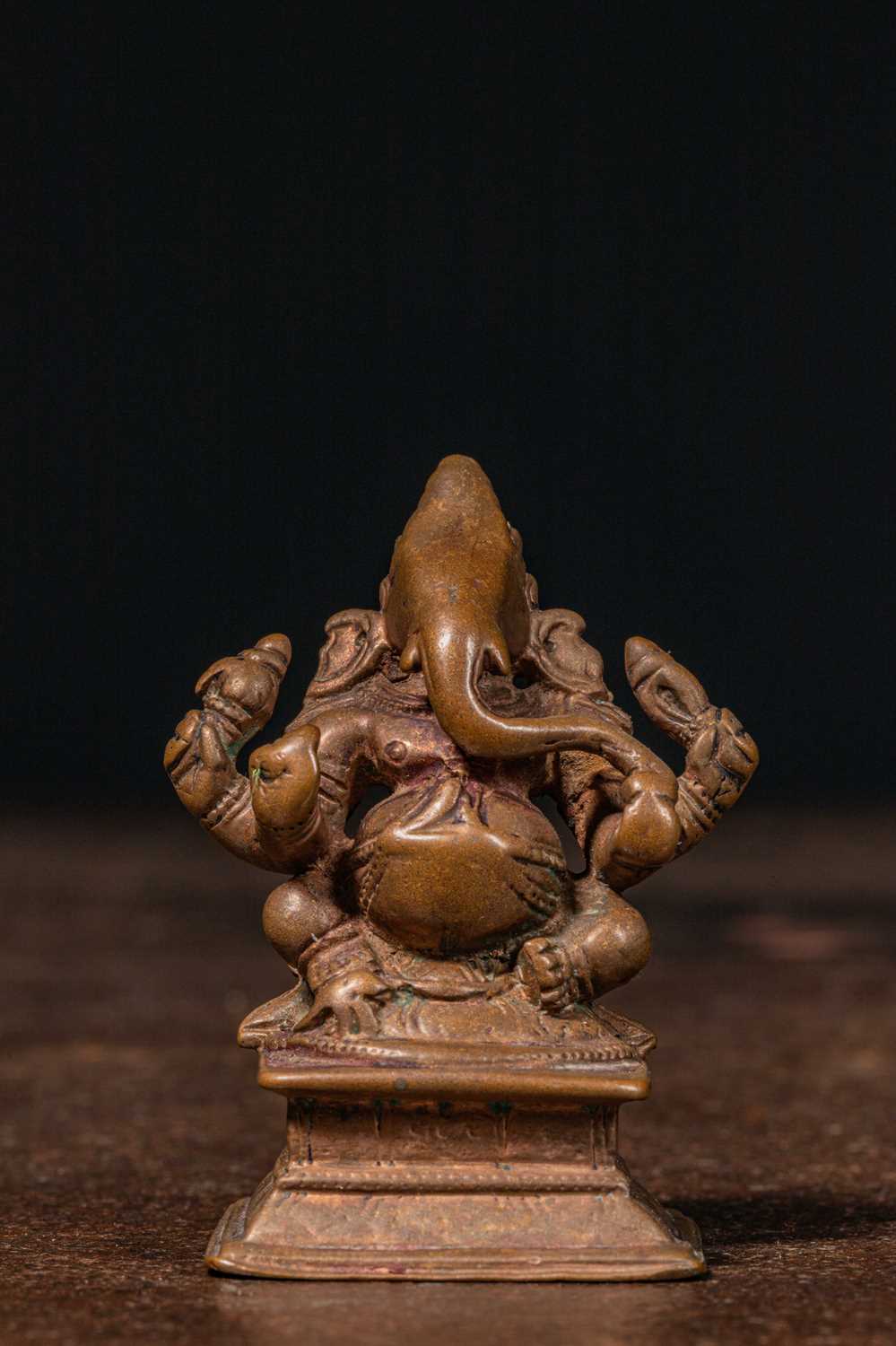 Lot 24 - SEATED BRONZE GANESHA INDIA 16TH CENTURY