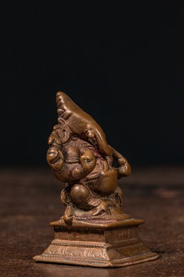 Lot 24 - SEATED BRONZE GANESHA INDIA 16TH CENTURY