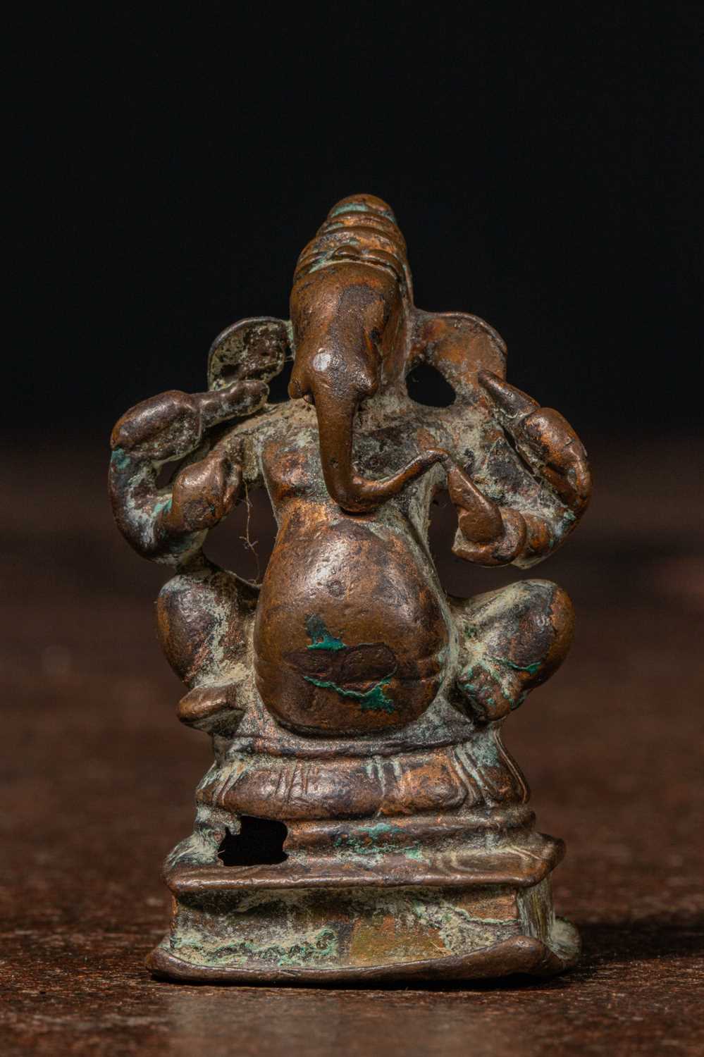 Lot 9 - SEATED BRONZE GANESHA NEPAL 16TH CENTURY