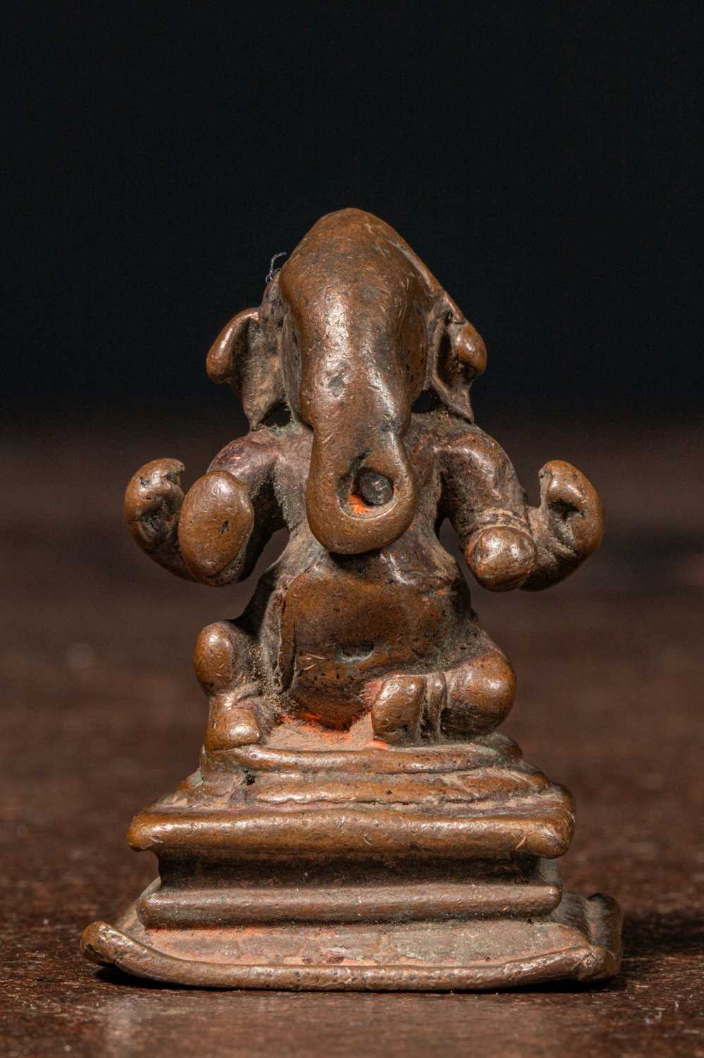 Lot 91 - SEATED BRONZE GANESHA INDIA 15TH CENTURY