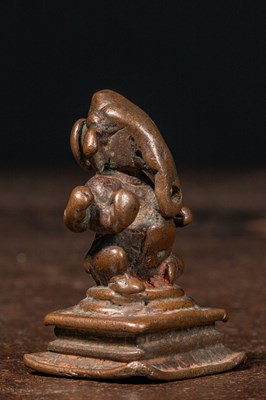Lot 91 - SEATED BRONZE GANESHA INDIA 15TH CENTURY