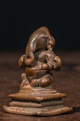 Lot 91 - SEATED BRONZE GANESHA INDIA 15TH CENTURY