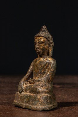 Lot 60 - SEATED RESTGILT BRONZE BUDDHA BIRMA 15TH CENTURY
