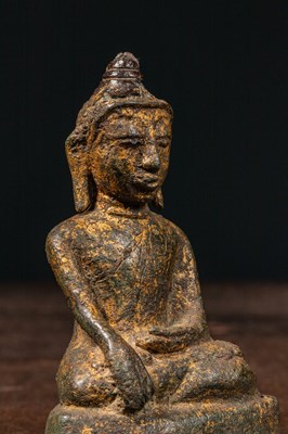Lot 60 - SEATED RESTGILT BRONZE BUDDHA BIRMA 15TH CENTURY
