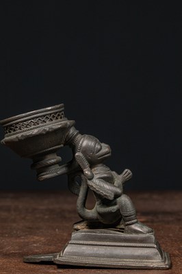 Lot 90 - A BRONZE FIGURE OF KNEELING HANUMAN INDIA 16TH CENTURY