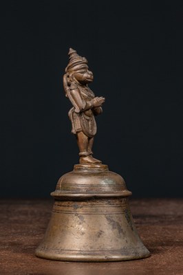 Lot 56 - STANDING BRONZE HANUMAN ON BELL INDIA 16TH CENTURY