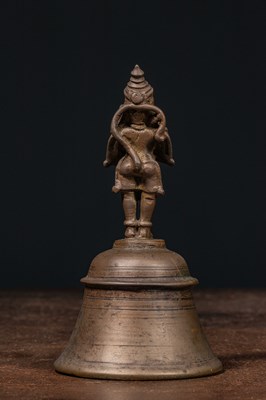 Lot 56 - STANDING BRONZE HANUMAN ON BELL INDIA 16TH CENTURY