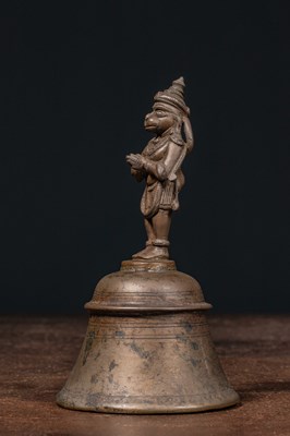 Lot 56 - STANDING BRONZE HANUMAN ON BELL INDIA 16TH CENTURY