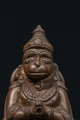 Lot 56 - STANDING BRONZE HANUMAN ON BELL INDIA 16TH CENTURY