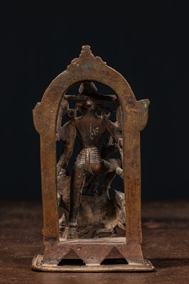 Lot 83 - A BRONZE FIGURE OF DURGA SLAYING THE BUFFALO DEMON (MAHIṢĀSURAMARDINĪ) INDIA 17TH CENTURY