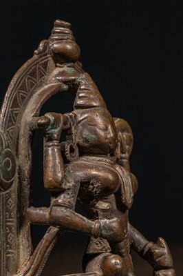 Lot 83 - A BRONZE FIGURE OF DURGA SLAYING THE BUFFALO DEMON (MAHIṢĀSURAMARDINĪ) INDIA 17TH CENTURY