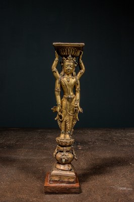 Lot 22 - A GILT-BRONZE DOUBLE-SIDED OFFERING GODDESS FROM A DENSATIL MONASTERY PILLAR TIBET 14TH CENTURY