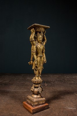 Lot 22 - A GILT-BRONZE DOUBLE-SIDED OFFERING GODDESS FROM A DENSATIL MONASTERY PILLAR TIBET 14TH CENTURY