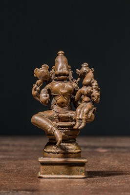 Lot 169 - A BRONZE FIGURE OF NARASIMHA WITH CONSORT INDIA 15TH CENTURY