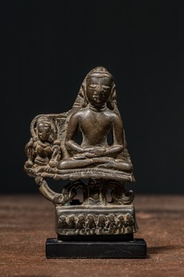 Lot 164 - EARLY BRONZE BUDDHA WITH SILVER EYES ON LOTUS KASHMIR REGION 9TH TO 10TH CENTURY