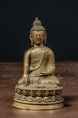 Lot 106 - SEATED BRONZE BUDDHA TIBET 15TH CENTURY WITH SILVER EYE