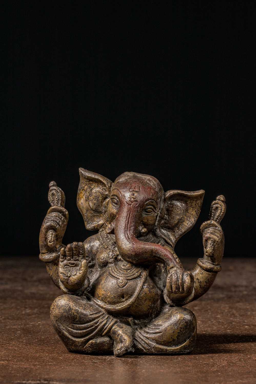 Lot 1 - SEATED BRONZE GANESHA NEPAL OR INDIA 18TH CENTURY