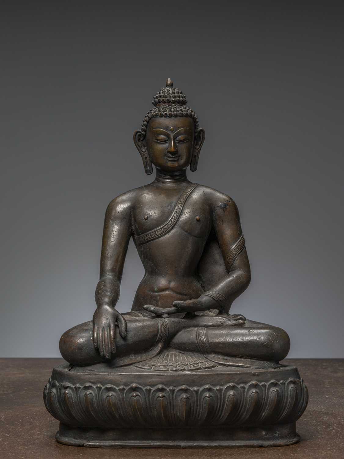 Lot 85 - A LARGE BRONZE FIGURE OF BUDDHA ŚĀKYAMUNI NEPAL 18TH CENTURY