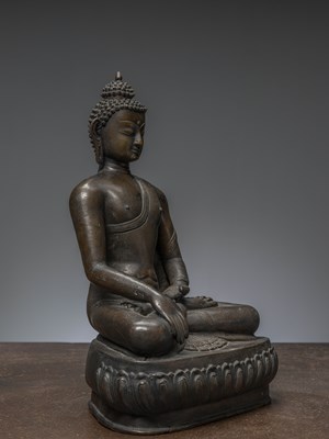 Lot 85 - A LARGE BRONZE FIGURE OF BUDDHA ŚĀKYAMUNI NEPAL 18TH CENTURY