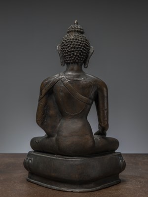 Lot 85 - A LARGE BRONZE FIGURE OF BUDDHA ŚĀKYAMUNI NEPAL 18TH CENTURY