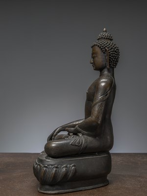 Lot 85 - A LARGE BRONZE FIGURE OF BUDDHA ŚĀKYAMUNI NEPAL 18TH CENTURY