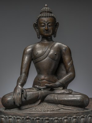 Lot 85 - A LARGE BRONZE FIGURE OF BUDDHA ŚĀKYAMUNI NEPAL 18TH CENTURY