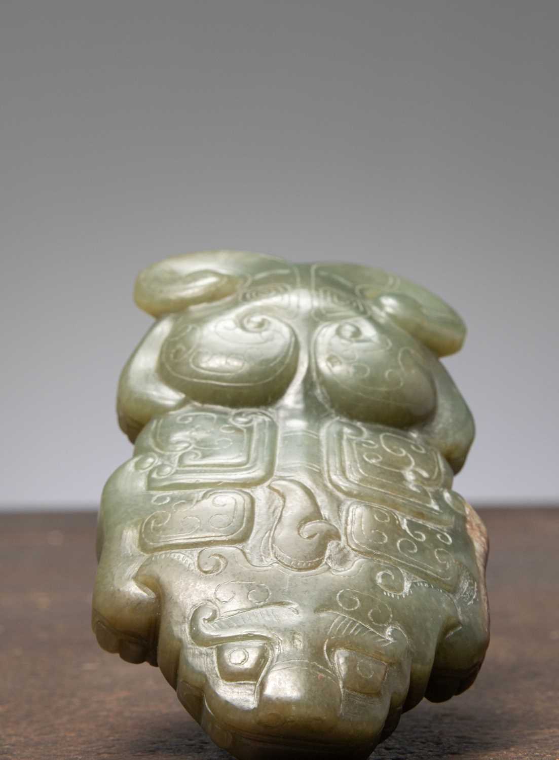 Lot 12 - (R) A CARVED JADE FIGURE OF A MYTHICAL BEAST CHINA SONG DNYASTY (960-1279)