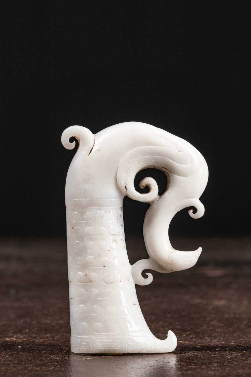 Lot 95 - (R) WHITE JADE IN RHYTON SHAPE CHINA 18TH CENTURY