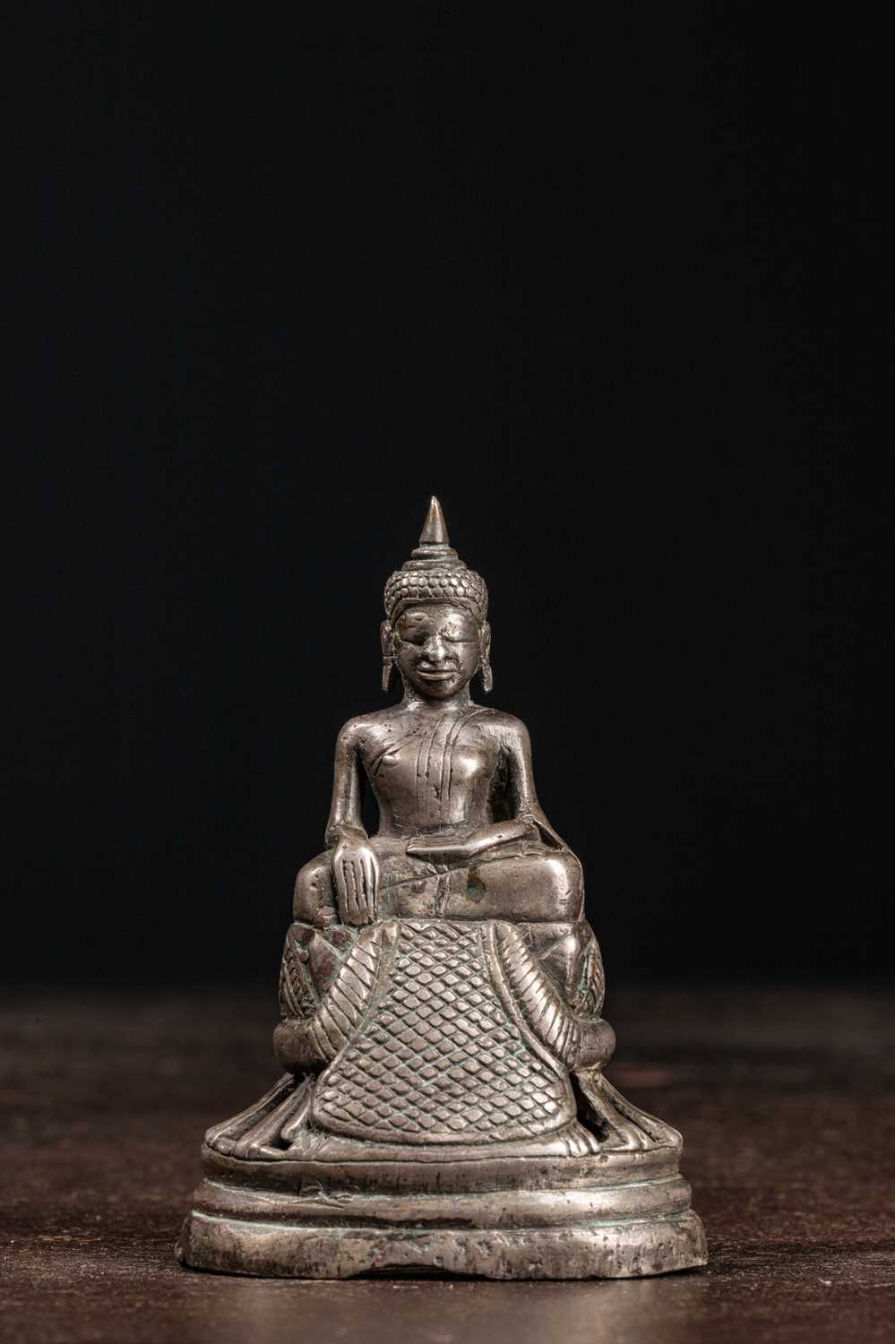 Lot 69 - (R) A SEATED SILVER ALLOY BRONZE BUDDHA BURMA 18TH CENTURY