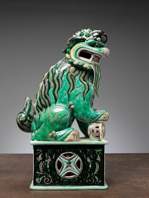 Lot 7 - (R) A RARE AND IMPRESSIVE SANCAI-GLAZED POTTERY FIGURE OF A BUDDHIST LION CHINA QING DYNASTY