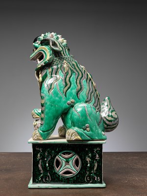 Lot 7 - (R) A RARE AND IMPRESSIVE SANCAI-GLAZED POTTERY FIGURE OF A BUDDHIST LION CHINA QING DYNASTY