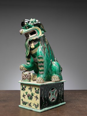 Lot 7 - (R) A RARE AND IMPRESSIVE SANCAI-GLAZED POTTERY FIGURE OF A BUDDHIST LION CHINA QING DYNASTY