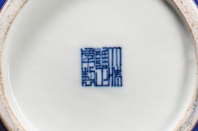 Lot 82 - (R) A MONOCHROME COBALT-BLUE DOUBLE GOURD VASE, CHINA, QING DYNASTY WITH QIANLONG MARK