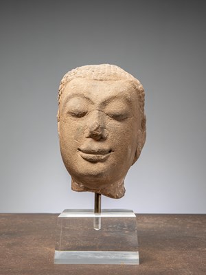 Lot 123 - (R) A SANDSTONE BUDDHA HEAD, KHMER, LOPBURI 13TH CENTURY