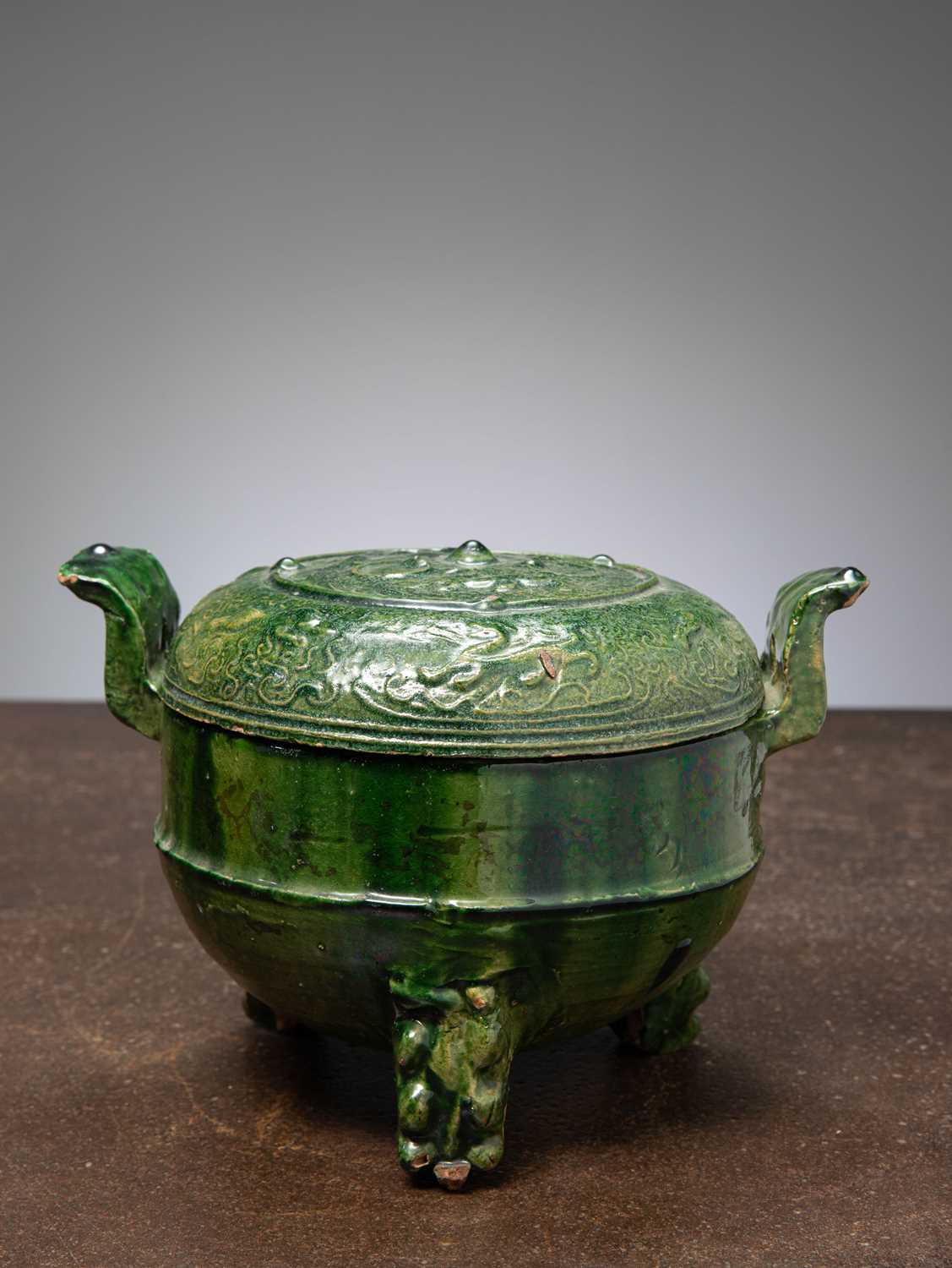 Lot 28 - (R) A GREEN-GLAZED POTTERY DING (TING) WITH COVER, HAN DYNASTY (206 BC–220 AD) CHINA