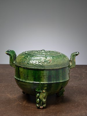 Lot 61 - (R) A GREEN-GLAZED POTTERY TRIPOD VESSEL WITH LID, CHINA, HAN DYNASTY (206 BC–220 AD)